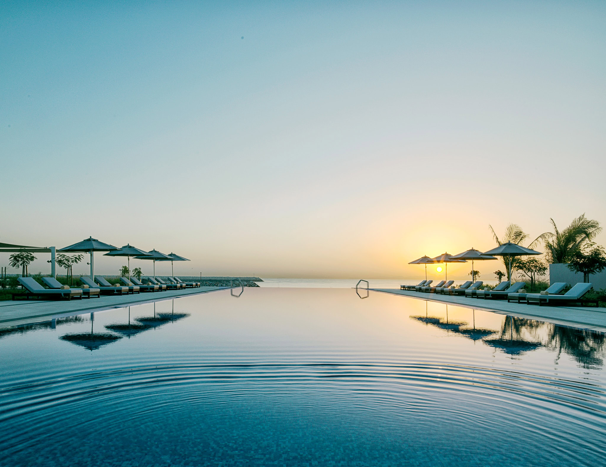 Kempinski Muscat Infiniti Pool Sunrise